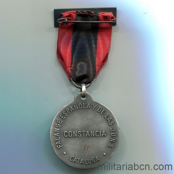 Militaria Barcelona Medalla de la Constancia de Falange y de las Jons de Cataluña.  Numerada en el reverso. cinta reverso