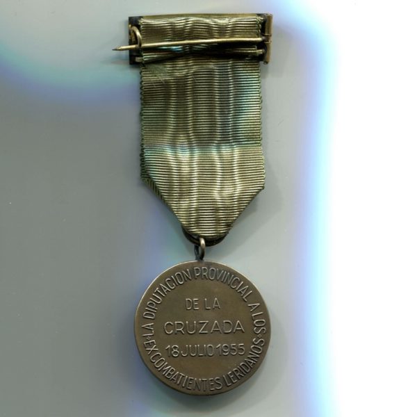 Militaria Barcelona Medalla Conmemorativa de los Excombatientes de Lérida de la Guerra Civil. Concedida por la Diputación Provincial. cinta reverso
