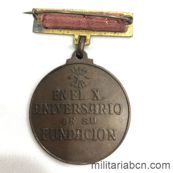 España. Medalla de la Sección Femenina de Falange en el X Aniversario de su Fundación reverso
