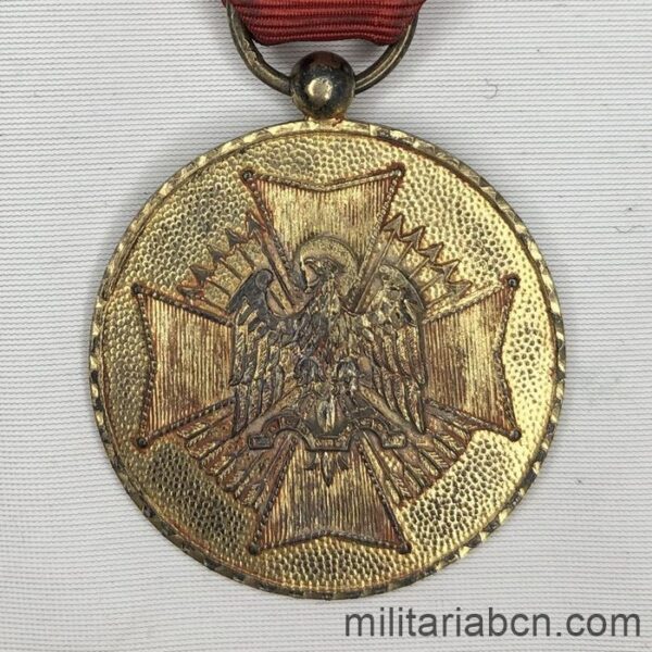 España. Medalla de la Orden de Cisneros.  1er Modelo (cinta en rojo). Medalla española