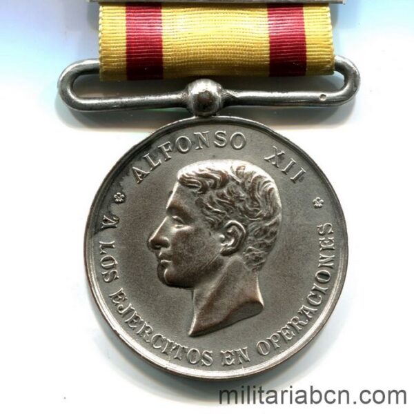 Medalla de Alfonso XII. 1875 .