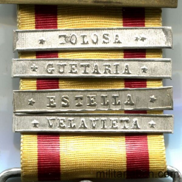 Medalla de Alfonso XII. 1875 . Con los pasadores Tolosa, Guetaria, Estella y Velavieta.