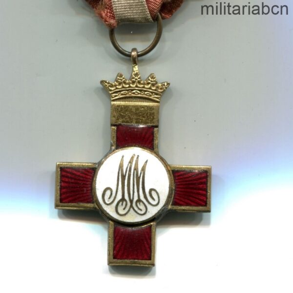 Cruz al Mérito Militar, distintivo rojo. Modelo Egaña. Con dos pasadores de repetición. reverso