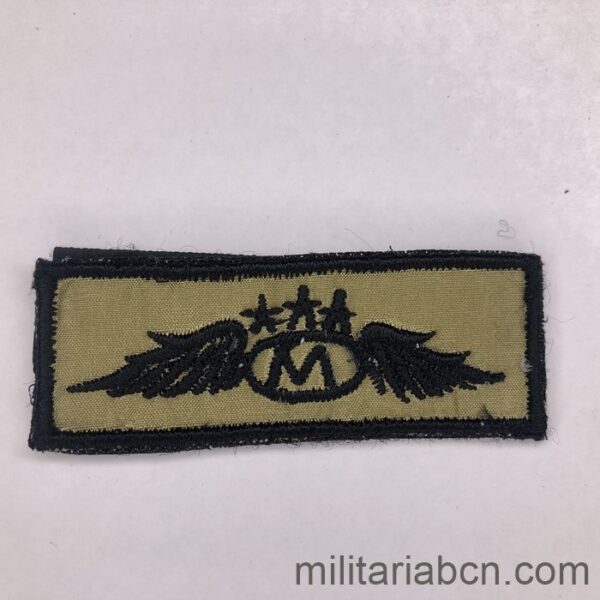 Indonesia. Special Forces patch. Sand background