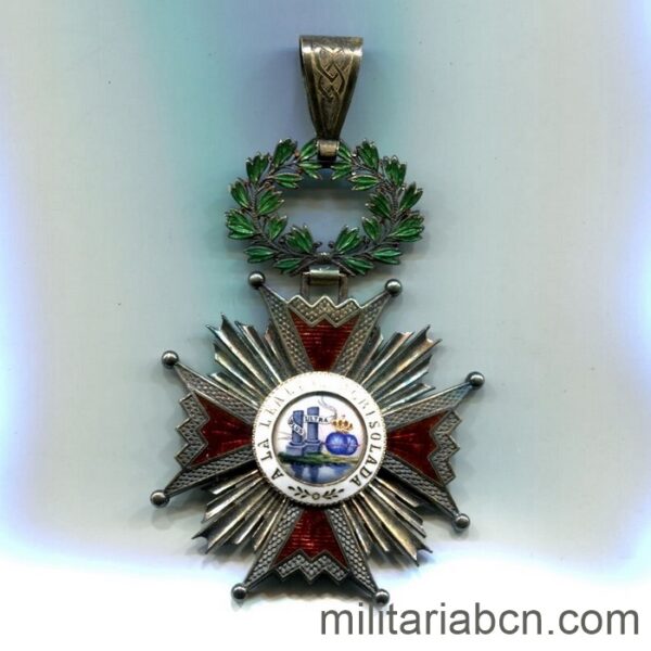 Cruz de Comendador de la Orden de Isabel la Católica.
