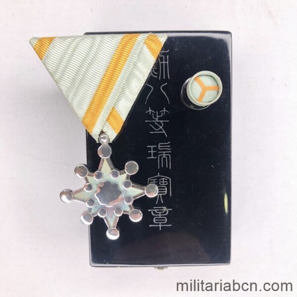 Japan. Order of the Sacred Treasure of the 8th Class. With original box and rosette.