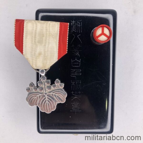 Japan. Order of the Rising Sun 8th Class. With original box and rosette.