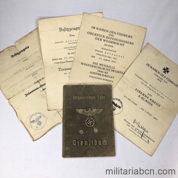 Set: Organization Todt Member Book and 4 Medal Awards awarded to a Gefreiten and then Oberbergefreiten of Infantry: